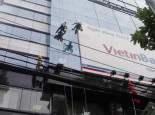 Dịch vụ lau kính tòa nhà Quận 1 Uy Tín