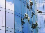 Dịch vụ  lau kính tòa nhà Quận 4 Uy Tín